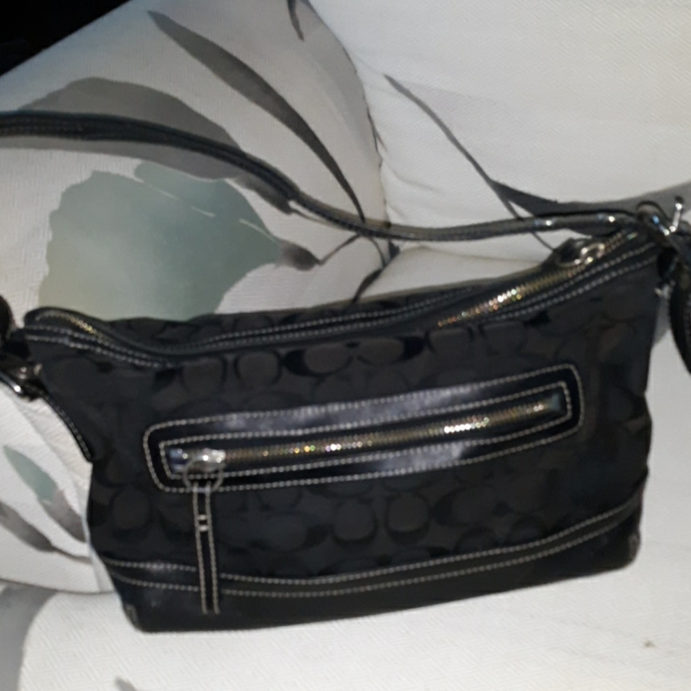 Coach black logo zipper pocket front